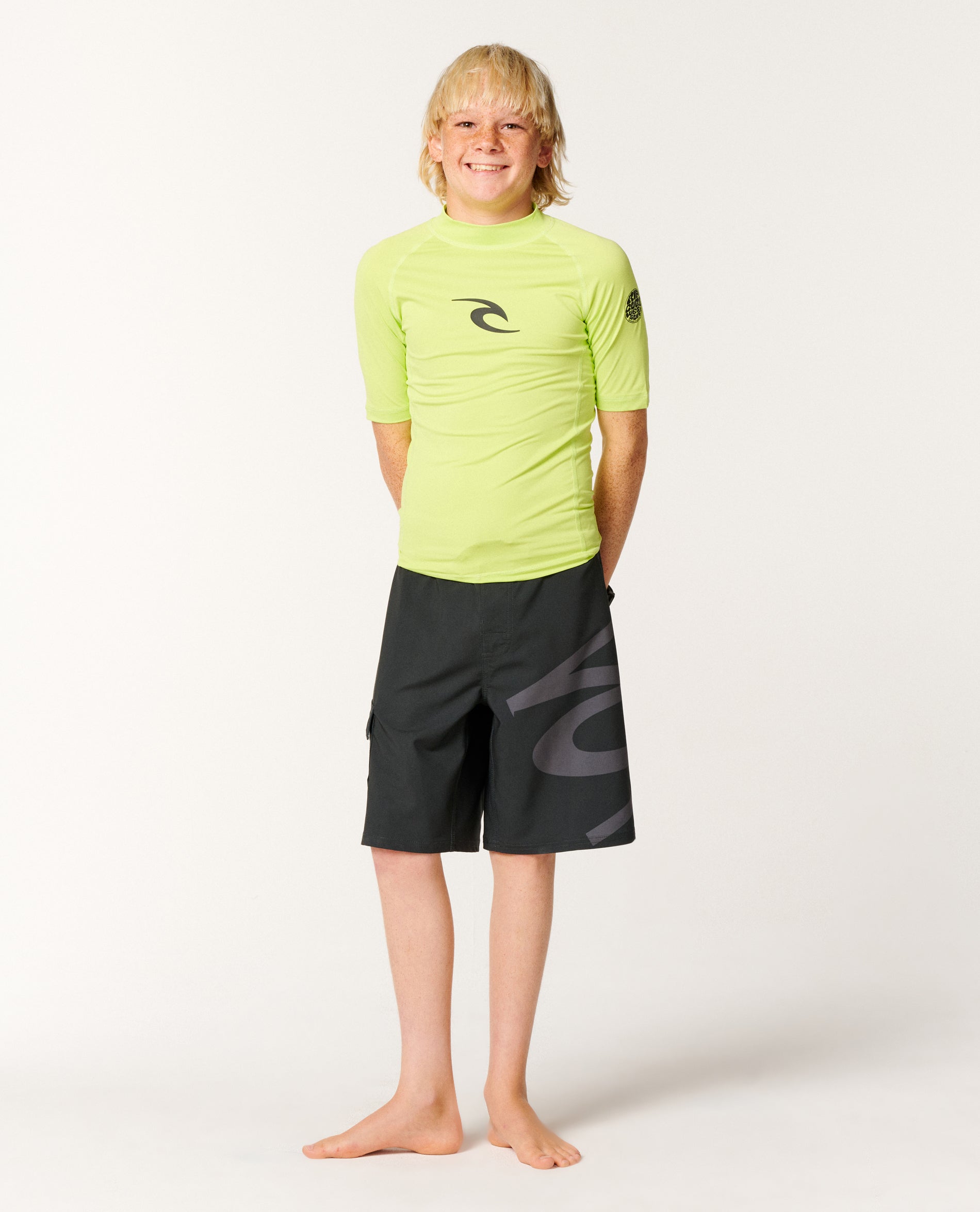 Rip Curl Maglietta A Maniche Corte Per Ragazzi, Lycra Wave SS, 2024, Colore Lime, Protezione UV UPF 50+, 92% Poliestere 8% Elastan
